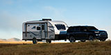 DGA Design Venture RV Sonic Lite Travel Trailer with Vehicle Towing Camper Photography