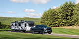 DGA Design Venture RV SportTrek Touring Edition Travel Trailer with Tow Vehicle Photography